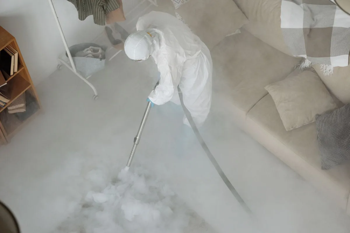 Biohazard cleanup technician in protective equipment, South Pittsburg, TN